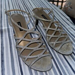 Caparros silver heels Size 8.5B Manmade upper-Leather Sole ~3” heel
